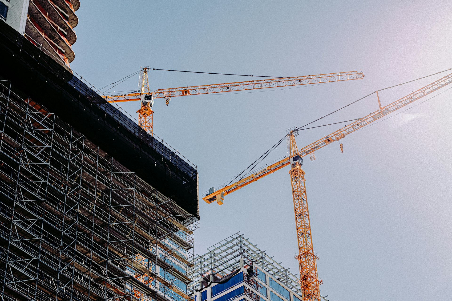 Crane and building under construction, representing bridging finance and development funding